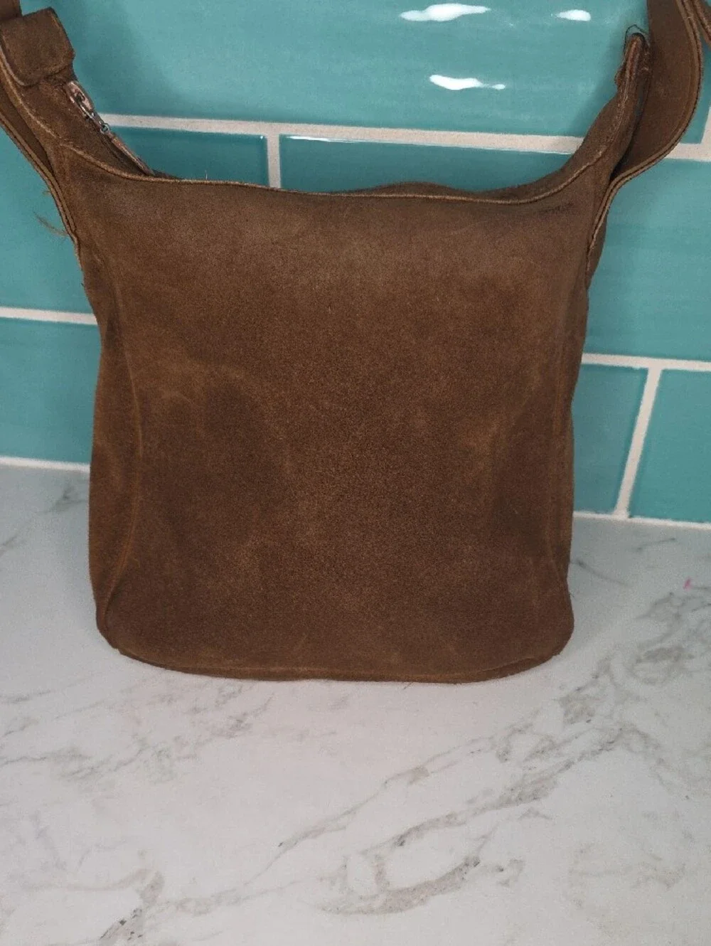 Minnetonka Fringed Suede Crossbody Bag in Brown